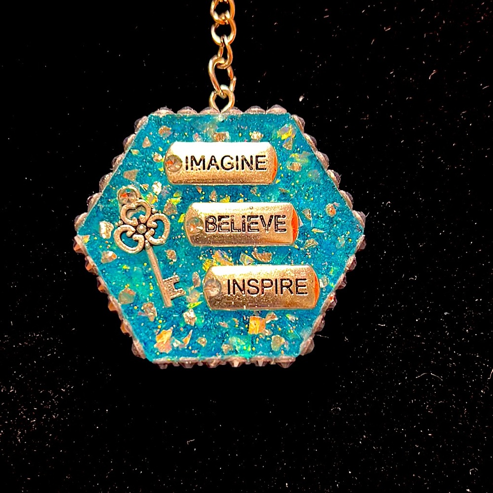 Resin keychain: “Imagine, Believe, Inspire”